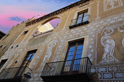 Low angle view of old building against sky