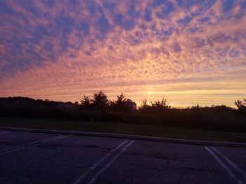 Empty road at sunset