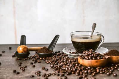 Close-up of coffee beans on table