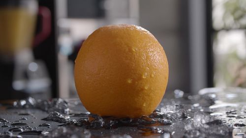 Close-up of orange on table