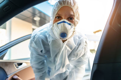 Portrait of woman in car