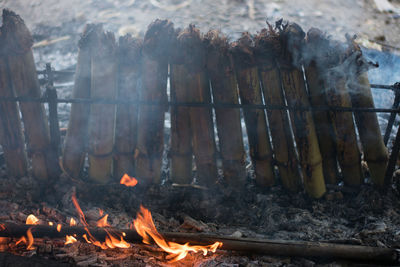 Panoramic view of bonfire on barbecue grill