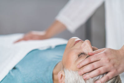 Close-up of woman getting massage at spa