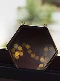 Close-up of yellow electric lamp