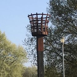 Low angle view of metal structure against sky