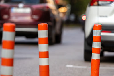 Close-up of traffic cones on road