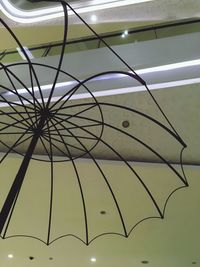 Low angle view of illuminated ceiling