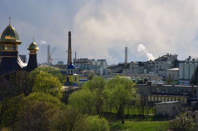 Panoramic view of buildings against sky