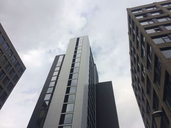 Low angle view of modern buildings against sky