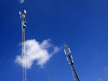 Gsm antenna of mobile communication on a blue sky background