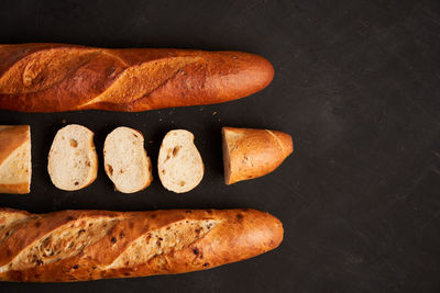 High angle view of bread on black background