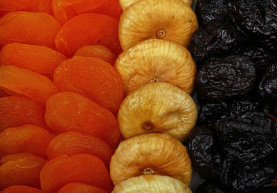 Close-up of dried apricots and figs with prunes for sale