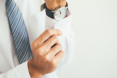 Midsection of man with hands