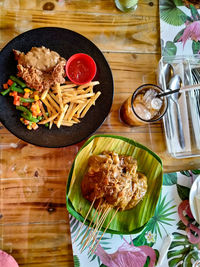 High angle view of food served on table