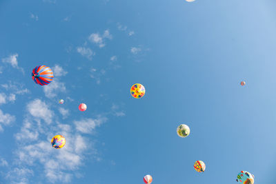 Low angle view of balloons in sky