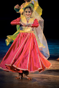 Midsection of woman dancing