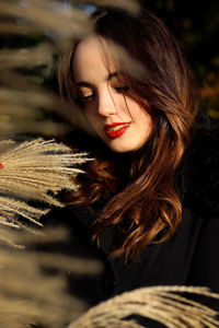 Portrait of young woman with eyes closed