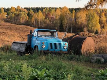 Abandoned pickup truck on land