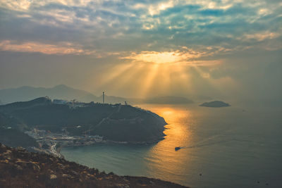 View of sea against cloudy sky