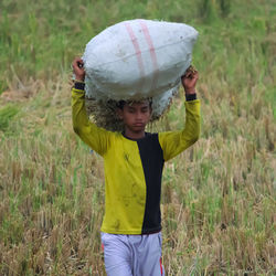 Full length of man standing on field