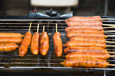 Close-up of meat on barbecue grill