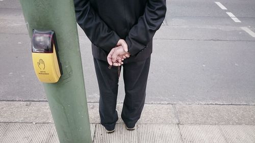 Man standing on road