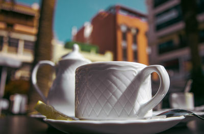 Close-up of coffee cup on table