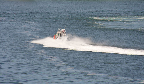 High angle view of boat sailing on sea