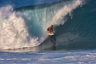 Man surfing in sea