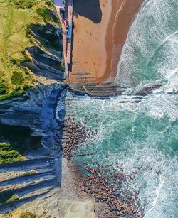 High angle view of water flowing through rocks