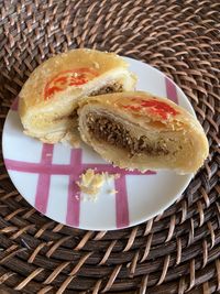 High angle view of bread in basket on table