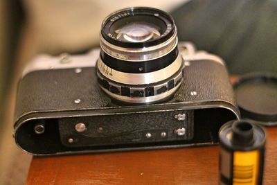 Close-up of camera on table