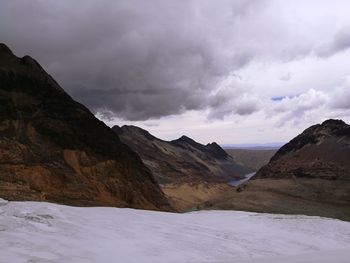 Scenic view of mountains against sky during winter