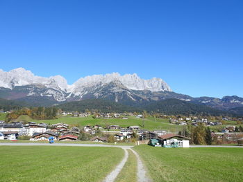 Panoramic view of landscape against clear blue sky