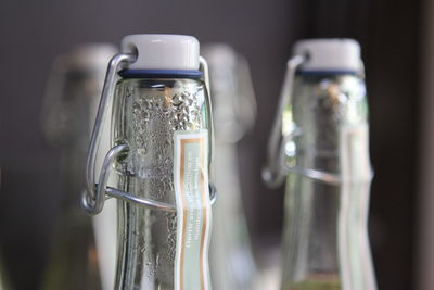 Close-up of bottle on glass