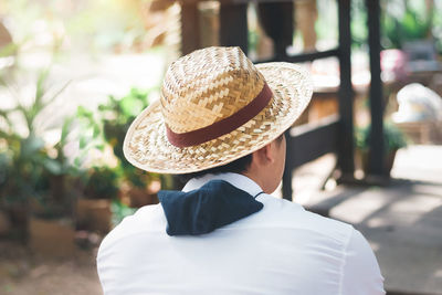 Rear view of man in hat