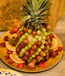 Close-up of fruits in plate on table