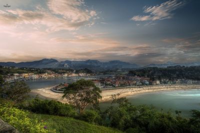 Panoramic over the town of ribadesella. mouth of the sella river and in the background the mountains