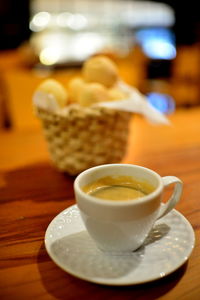 Close-up of coffee cup on table