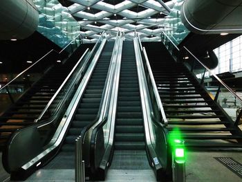 Low angle view of escalators in building