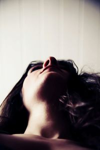 Close-up of young woman with eyes closed