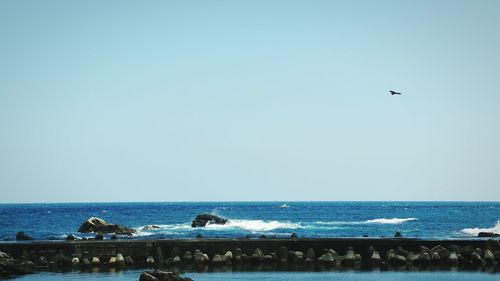 Scenic view of sea against clear sky