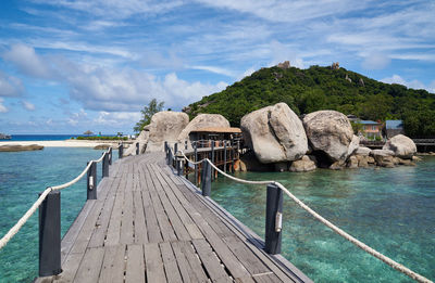 Panoramic view of pier on sea against sky