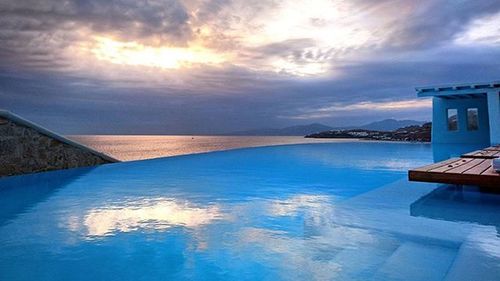 Scenic view of landscape against cloudy sky