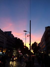 Silhouette of city street at sunset