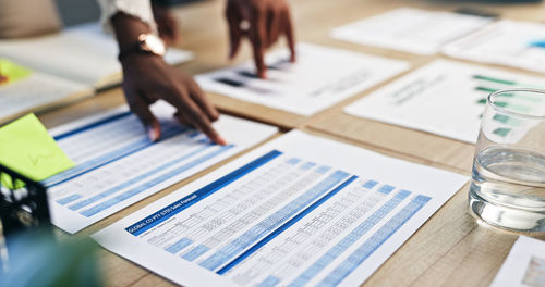 High angle view of business colleagues working on table