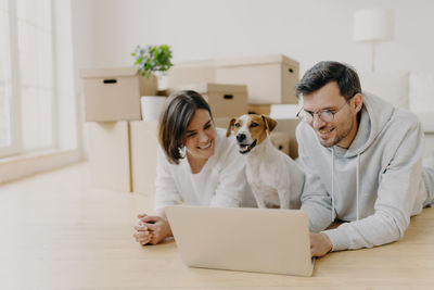 Two dogs on laptop