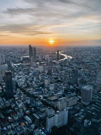 High angle view of cityscape against sky during sunset