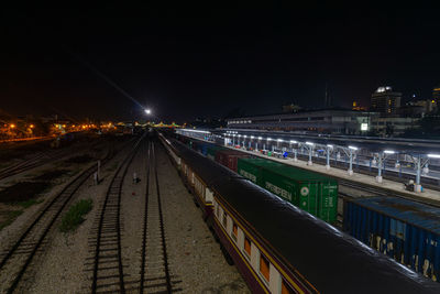 High angle view of railroad tracks at night