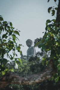 Low angle view of statue against clear sky